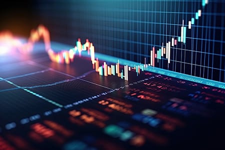 Gráfico financiero a todo color que muestra tendencias alcistas y bajistas en una pantalla digital con diversos datos numéricos.