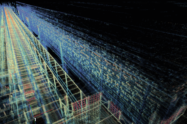 Obra de arte digital abstracta en la que se entrecruzan líneas y cuadrículas luminosas en azul, creando una escena futurista y dinámica.