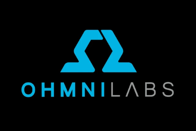 OhmniLabs logo with a stylized blue emblem above black text on a dark background