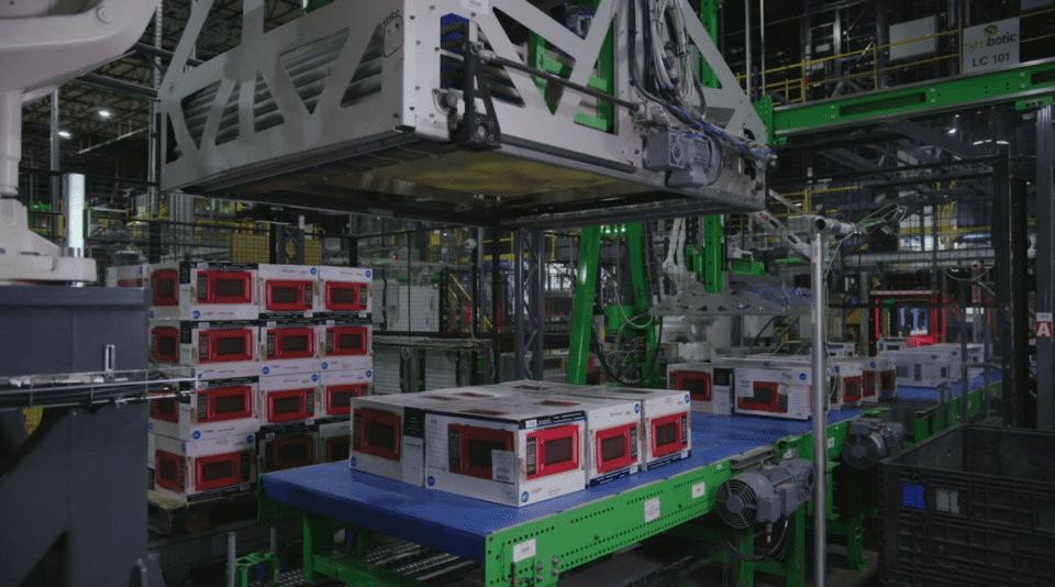 pallet-of-cases-robotically-placed-on-conveyor-symbotic-automation
